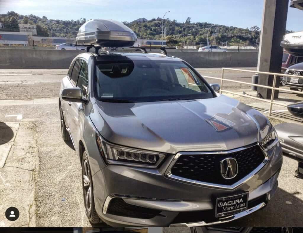 Acura MDX outfitted with Thule Roof Rack and Alpine Rooftop Cargo Box