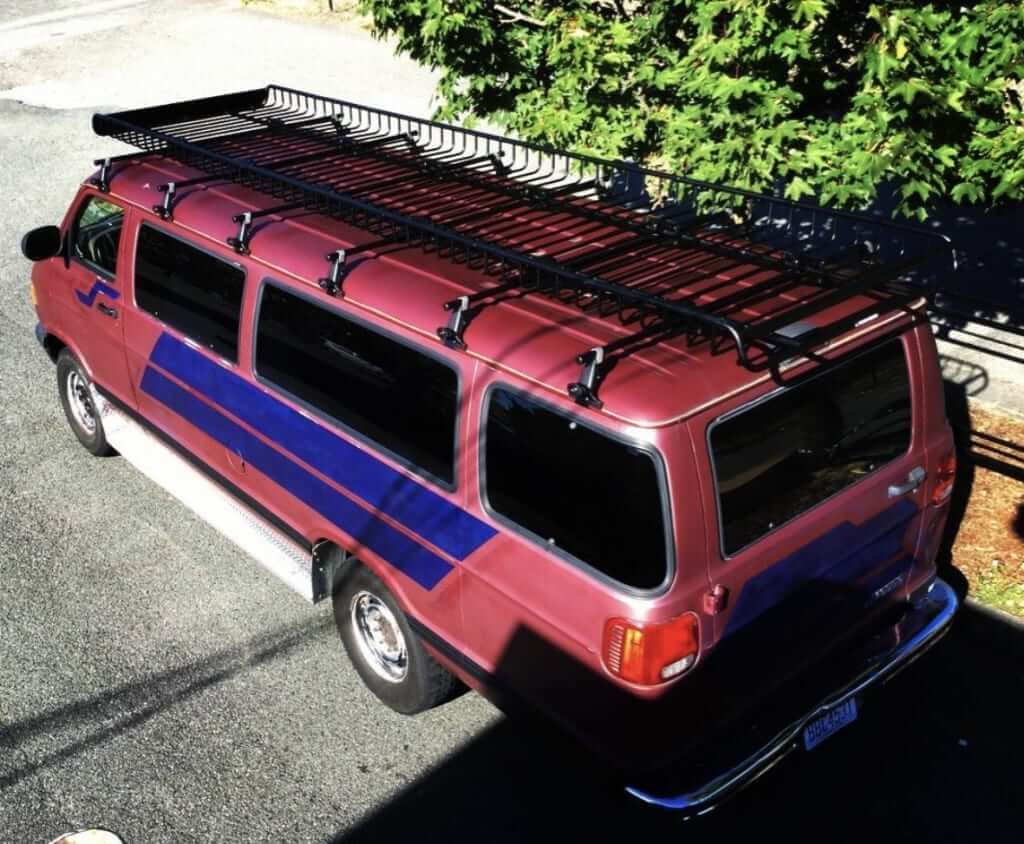 Dodge B250 Van with Yakima Gutter Roof Rack and Yakima MegaWarrior Rooftop Basket with Muiltple Extensions Rack N Road