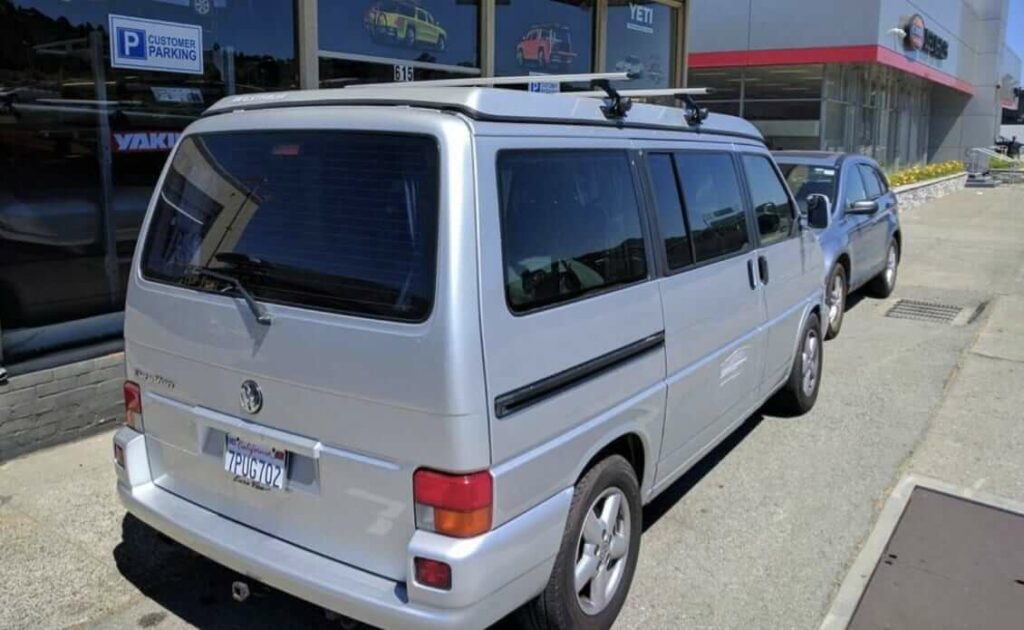 VW EuroVan Camper outfitted with Tailored Fit Thule Artificial Raingutters and Thule Evo WingBar Gutter Mount Roof Rack Rack N Road