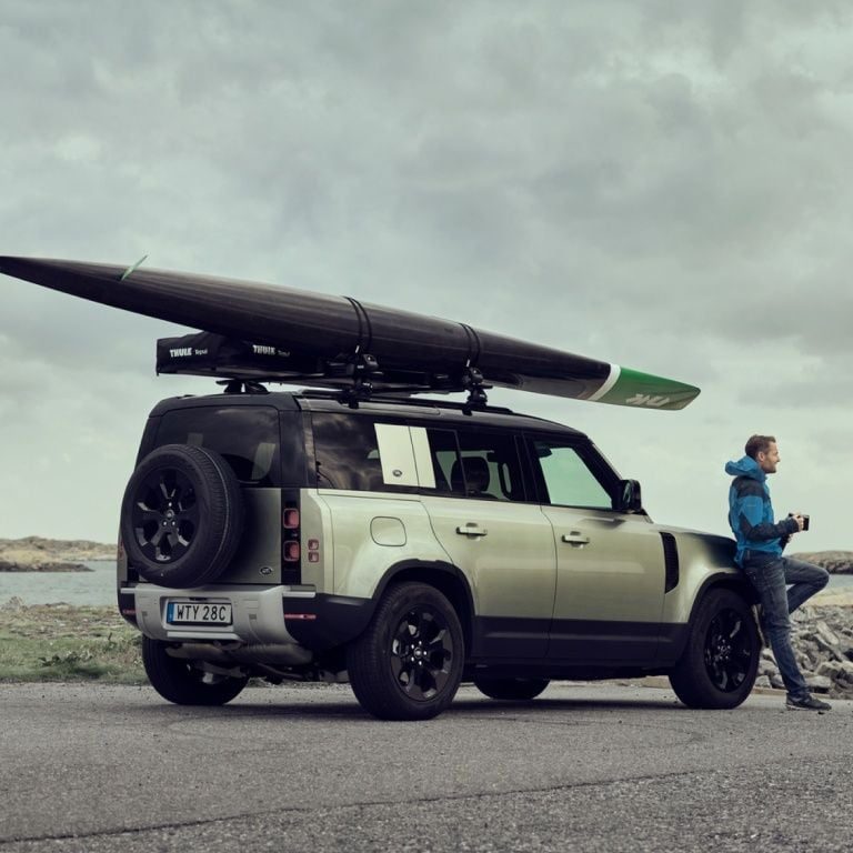 SUV with Thule kayak rack